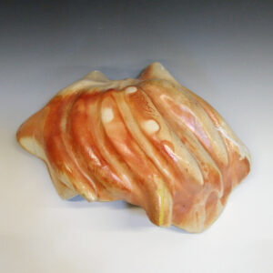 Banana Bowl 03 is a soda-fired ceramic fruit bowl with a sunshine yellow glaze over a warm brown nerikomi checker pattern.