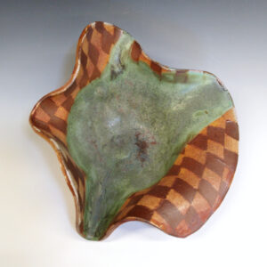 Cantaloupe Bowl 01 is a soda-fired ceramic fruit bowl with a bright green glaze over a warm brown nerikomi checker pattern.