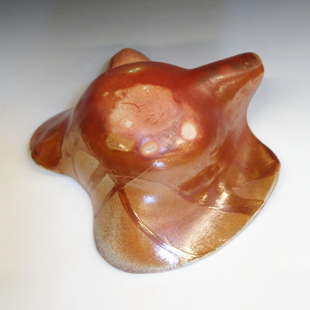 Cantaloupe Bowl 01 is a soda-fired ceramic fruit bowl with a bright green glaze over a warm brown nerikomi checker pattern.