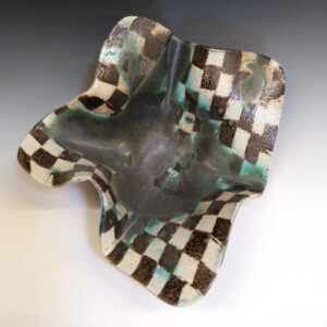 Cantaloupe Bowl 02 is a soda-fired ceramic fruit bowl with a blue-black glaze over a dark brown nerikomi checker pattern.