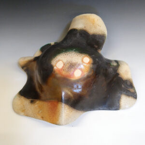 Cantaloupe Bowl 02 is a soda-fired ceramic fruit bowl with a blue-black glaze over a dark brown nerikomi checker pattern.