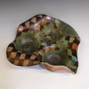 Orange Bowl 02 is a soda-fired ceramic fruit bowl with a bright green glaze over a dark brown nerikomi checker pattern.